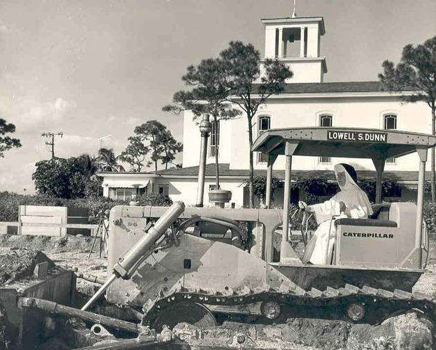 Sister Mary Alice Collins, O.P.,operating a Caterpillar bulldozer